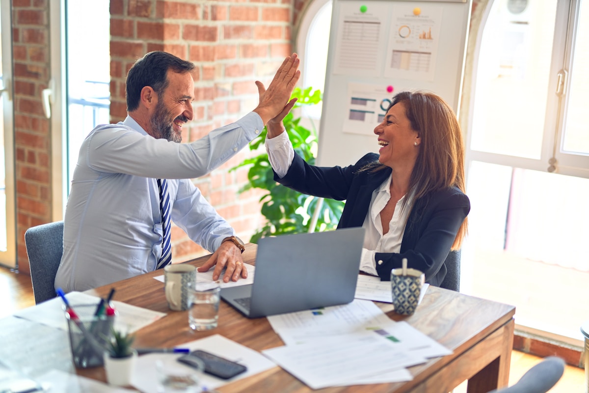 PitchDrive FAQ consultation with client reviewing performance metrics